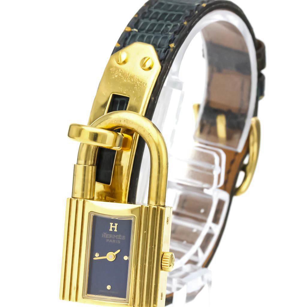 Hermes Kelly Quartz Gold Plated Women's Dress/Formal: Hermes Kelly Quartz Gold Plated Women's Dress/FormalBrand: Hermes Line: Kelly Gender: Women Material (Case): Gold plated Material (Band): Leather Color (Dial): Blue Movement: Quartz Case Diameter: 20m