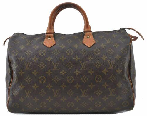 Louis Vuitton Monogram Speedy 35 Hand Bag Old Model LV: Louis Vuitton Monogram Speedy 35 Hand Bag Old Model LV Brand: Louis Vuitton Exterior Material: Monogram Canvas Style: Hand Bag Department: Women Exterior Color: Brown Bag Height: 9inches(23cm) Bag Dep