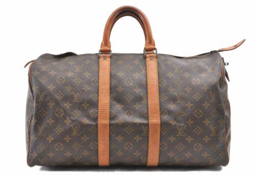 Louis Vuitton Monogram Keepall 45 Boston Bag Old Model: Louis Vuitton Monogram Keepall 45 Boston Bag Old Model LV Brand: Louis Vuitton Exterior Material: Monogram Canvas Style: Boston Bag Department: Women Exterior Color: Brown Bag Height: 10inches(25cm) B