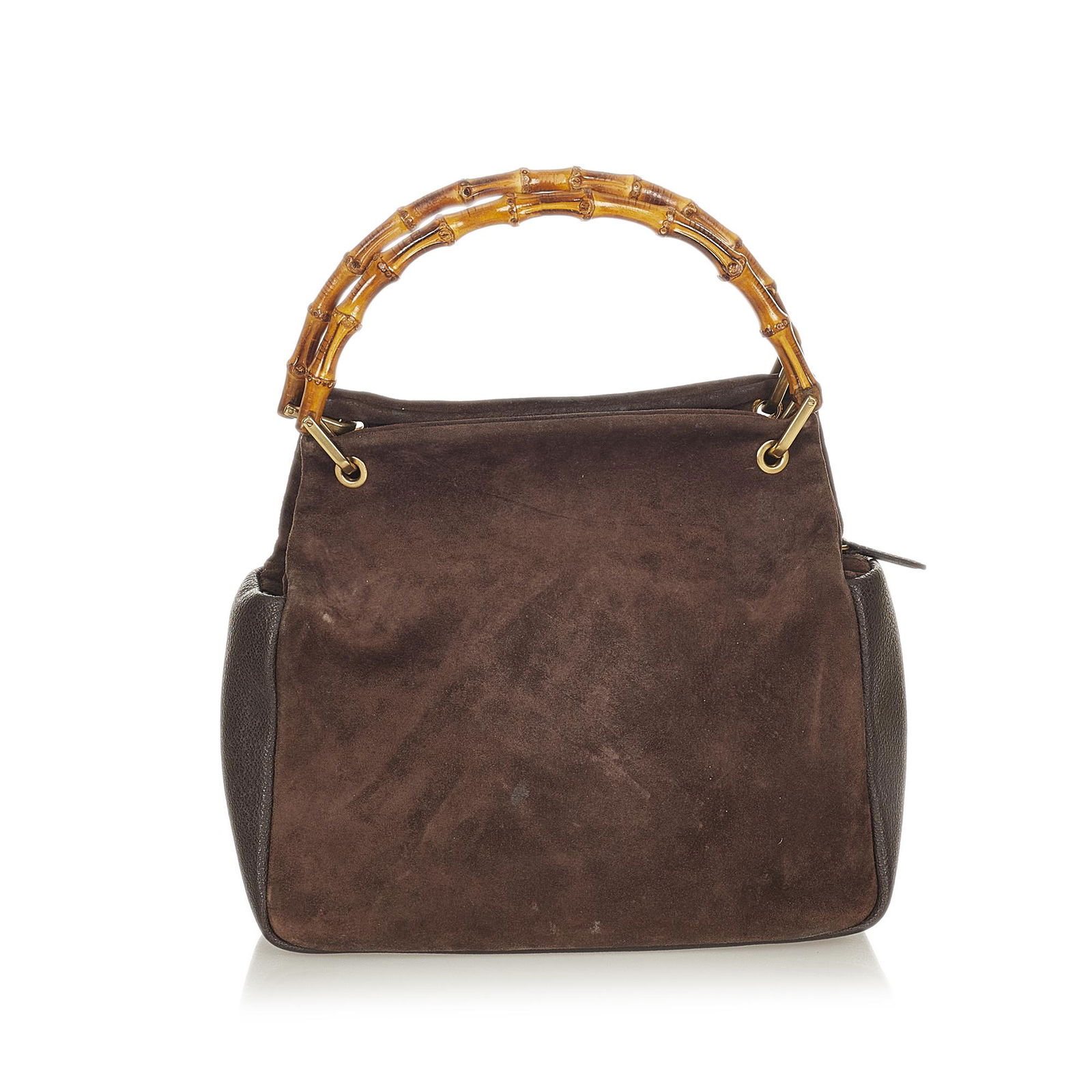 Gucci Bamboo Suede Handbag: Gucci Bamboo Suede Handbag This handbag features a suede body with leather trim bamboo top handles open top with magnetic closure and an interior zip pocket. Brand: Gucci Model: Bamboo Suede Handbag O