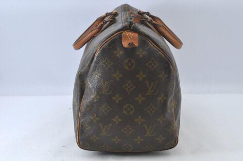 Louis Vuitton Monogram Speedy 35 Hand Bag Old Model LV: Louis Vuitton Monogram Speedy 35 Hand Bag Old Model LV Brand: Louis Vuitton Country/Region of Manufacture: France Bag Length: 14inches(35cm) Bag Height: 9inches(23cm) Bag Depth: 7.5inches(19cm) Handle