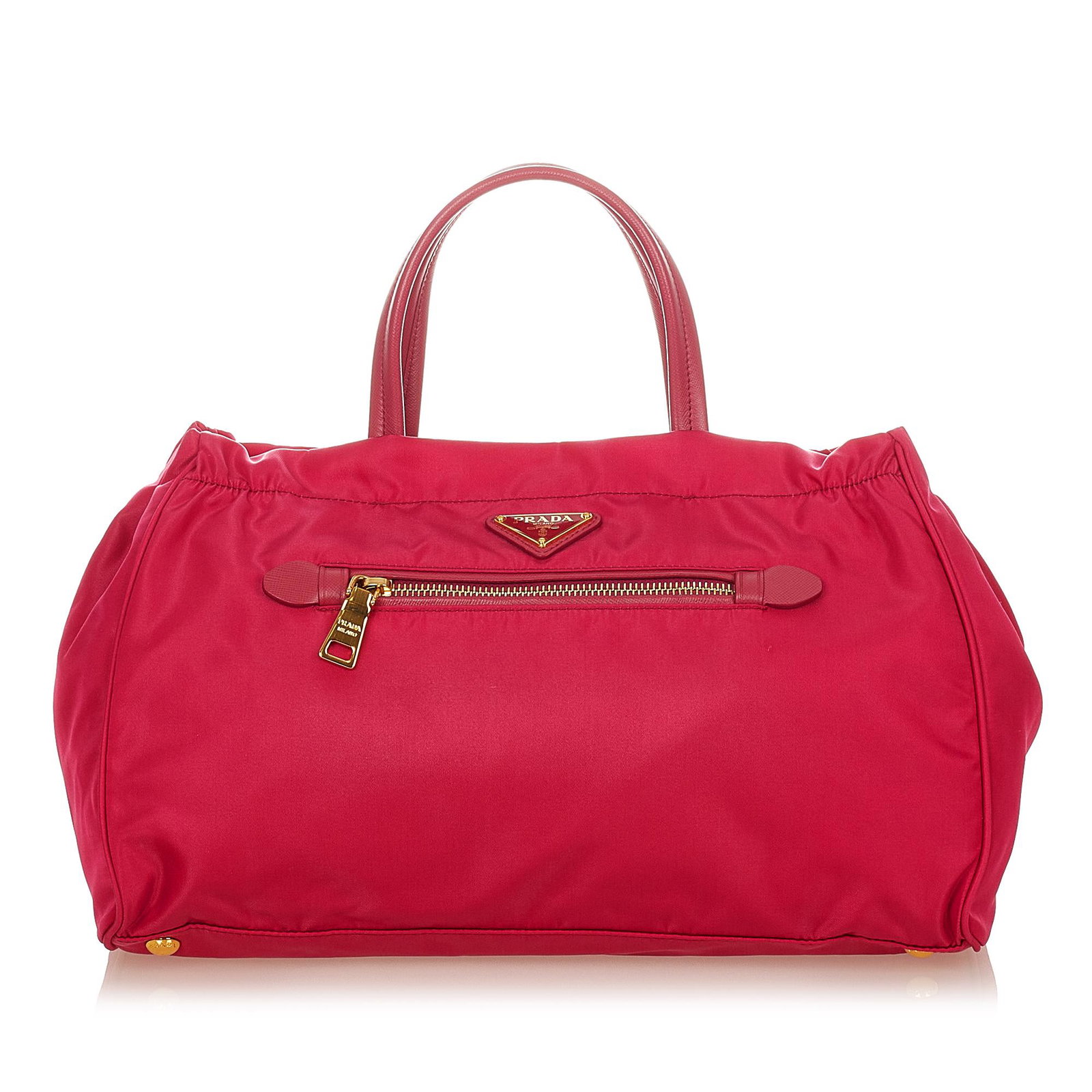 Prada Tessuto Handbag: Prada Tessuto Handbag This handbag features a nylon body an exterior front zip pocket flat leather handles a top zip closure and interior zip and slip pockets. Brand: Prada Model: Tessuto Handbag Orig