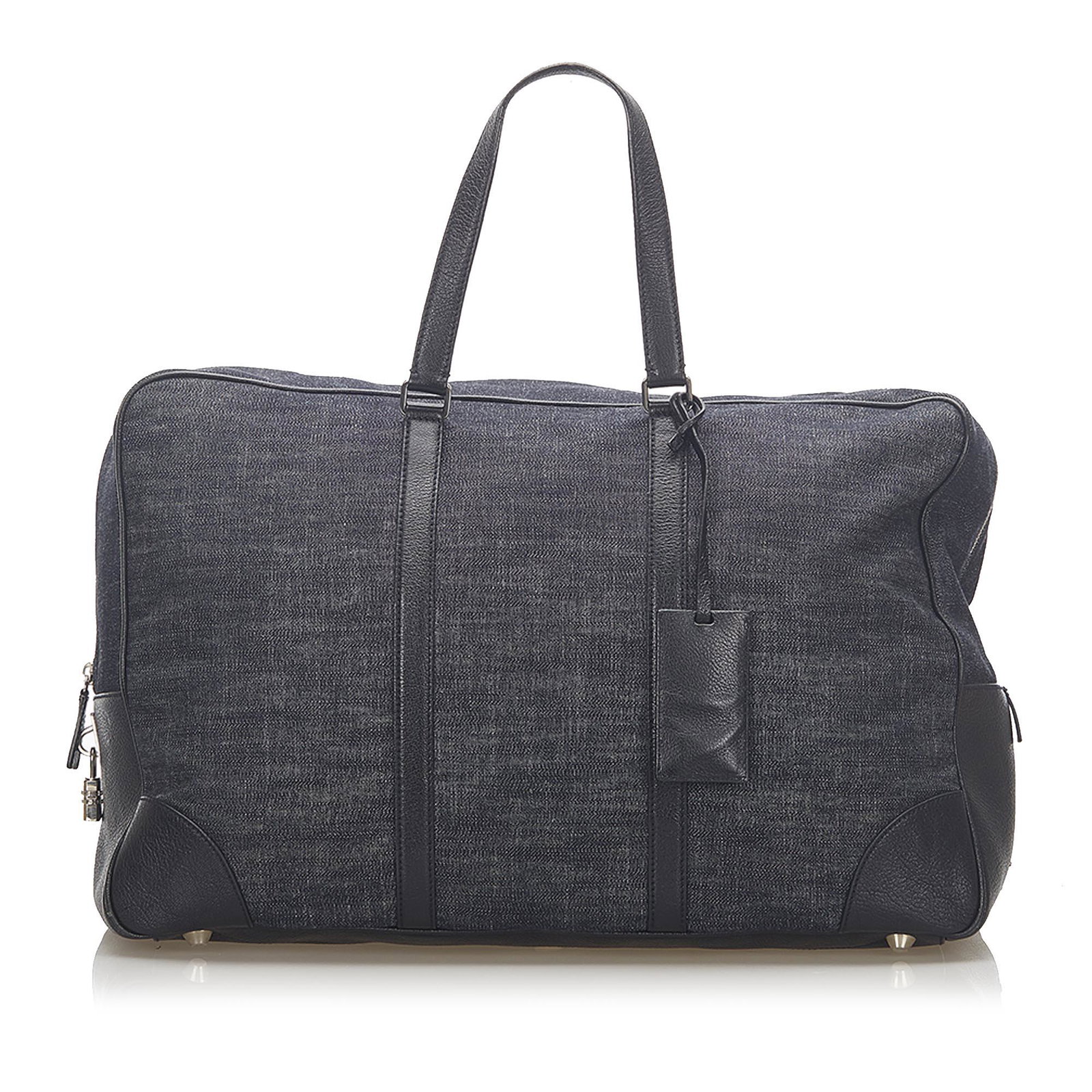 Prada Denim Travel Bag: Prada Denim Travel Bag This travel bag features a denim body with leather trim rolled leather handles and a top zip closure. Brand: Prada Model: Denim Travel Bag Origin: France Category: Bags Color: B