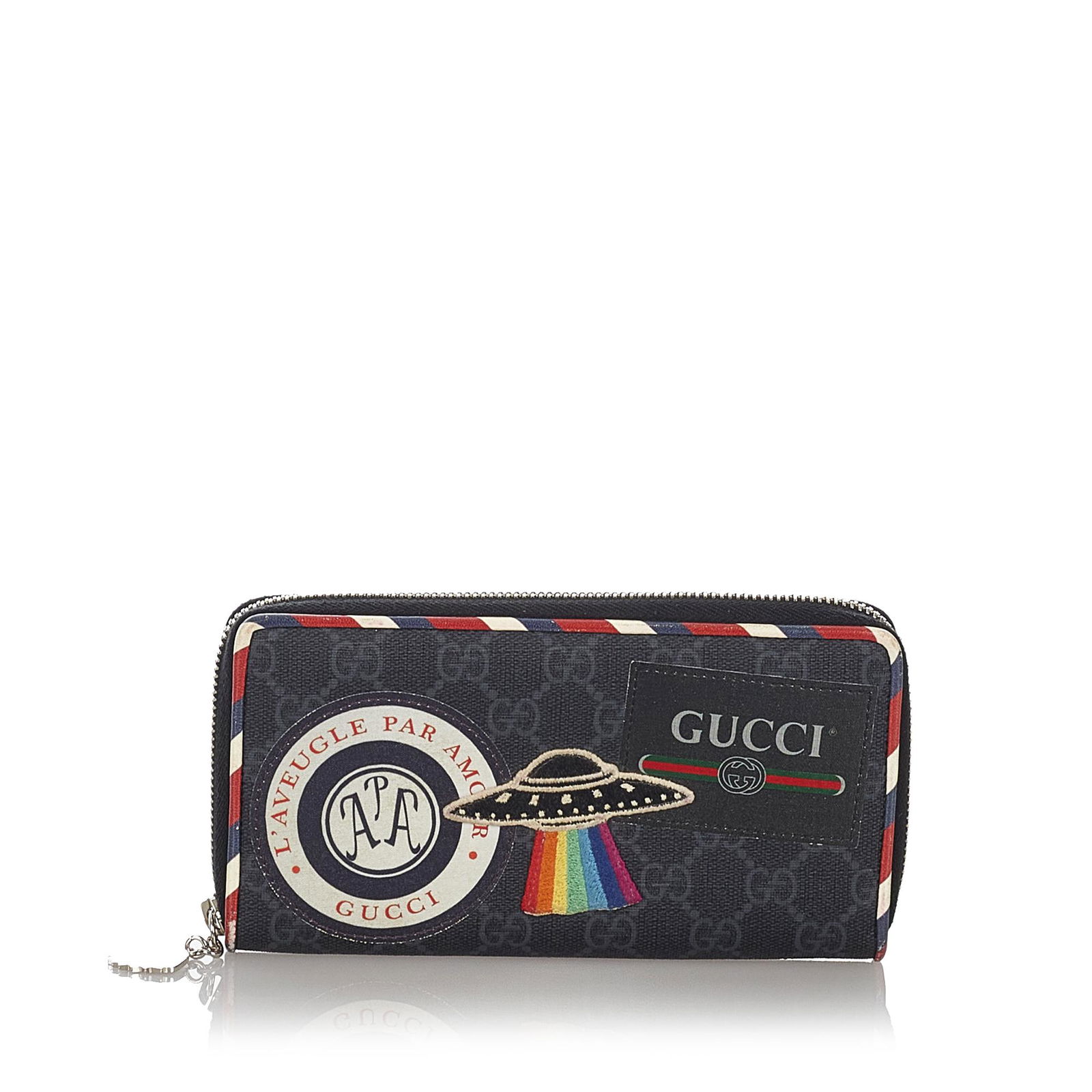 Gucci GG Supreme Night Courrier Long Wallet: Gucci GG Supreme Night Courrier Long Wallet This long wallet features a coated canvas body with leather trim a zip around closure and interior zip and slip compartments. Brand: Gucci Model: GG Supreme