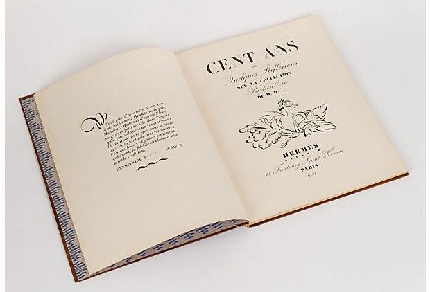 Hermes 1928 100 Years Anniversary Book: Hermes 1928 100 Years Anniversary Book Condition: Very Good; minor wear on corners Era: Vintage; 1910-1950 Dimensions: 10.5" L x 0.5" W x 8" H Materials: paper Color: brown beige Hermes rare 100 anniv