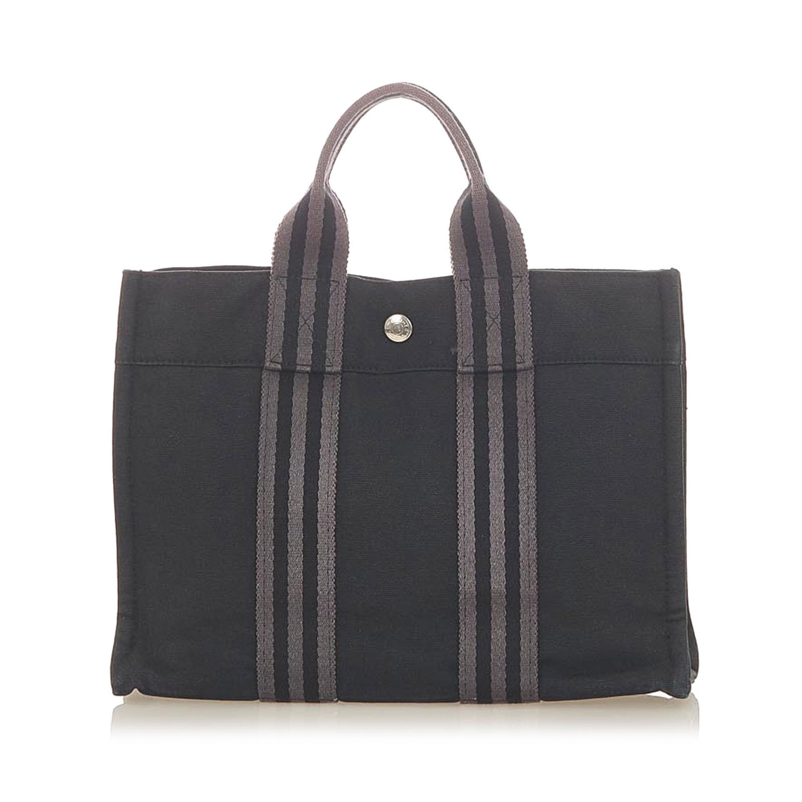 Hermes Fourre Tout PM: Hermes Fourre Tout PM The Fourre Tout PM features a canvas body flat straps an open top with magnetic snap closure and an interior zip pocket. Brand: Hermes Model: Fourre Tout PM Origin: France Catego