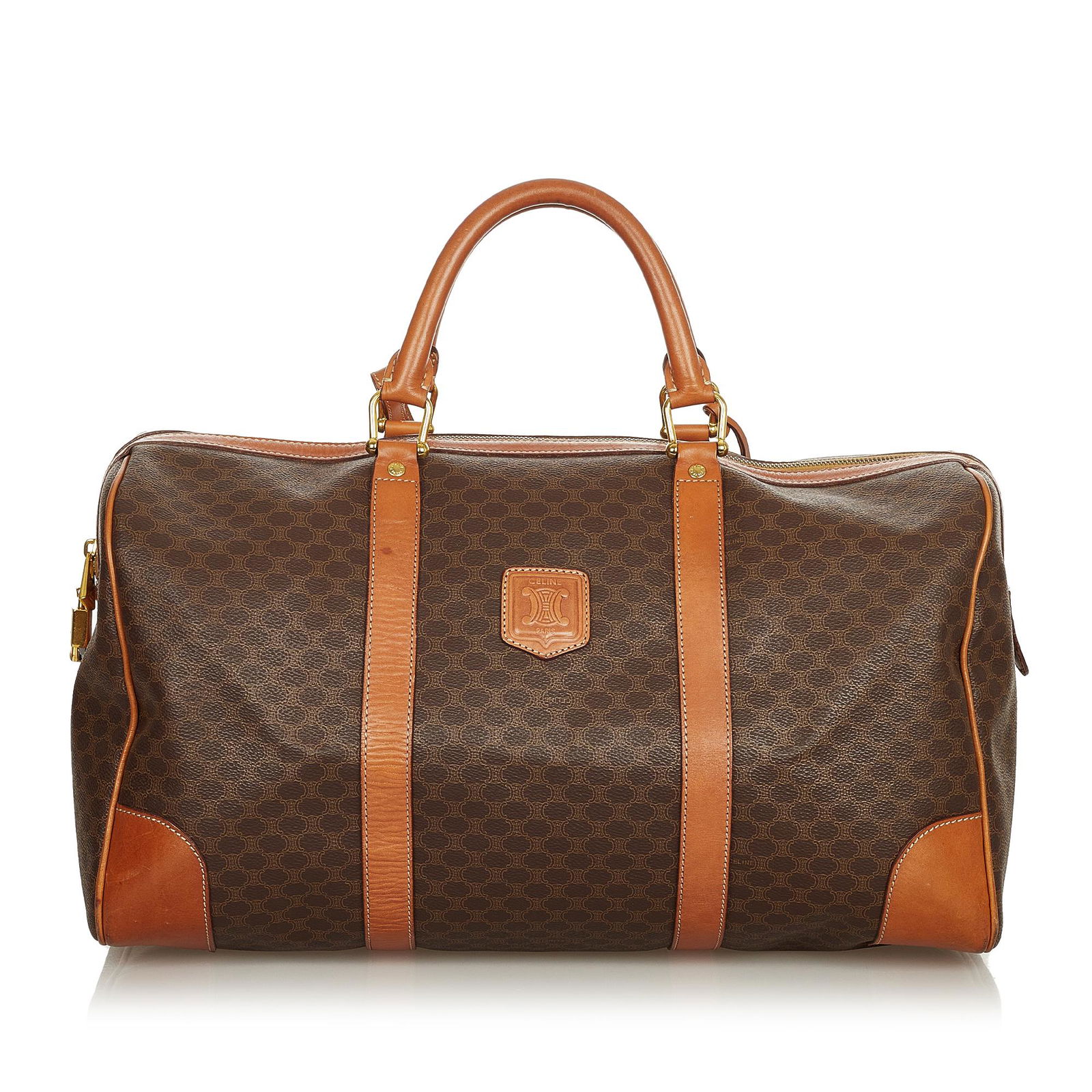 Celine Macadam Travel Bag: Celine Macadam Travel Bag This travel bag features a PVC body with leather trim rolled leather handles a top zip closure and an interior zip pocket. Brand: Celine Model: Macadam Travel Bag Origin: Fra