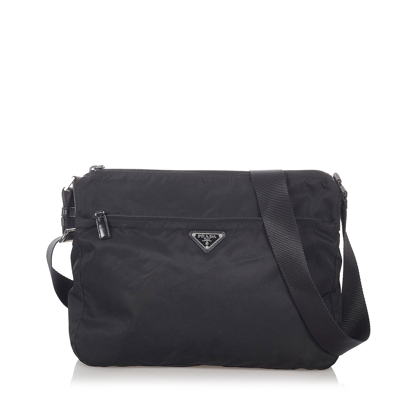 Prada Tessuto Crossbody Bag: Prada Tessuto Crossbody Bag This crossbody bag features a nylon body an exterior front zip pocket an adjustable flat strap a top zip closure and an interior zip pocket. Brand: Prada Model: Tessuto Cro