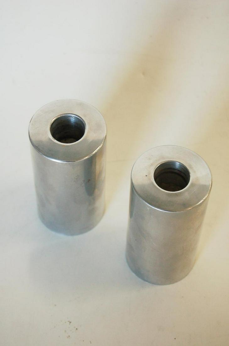 Pair of Mid-Century Modern Aluminum Circular Candle: Pair of Mid-Century Modern Aluminum Circular Candle Column Holders Dimensions: Height: 4 in. (10.16 cm) Dimensions: Diameter: 2 in. (5.08 cm) Sold As: Set of 2 Style: Mid-Century Modern (Of the Period