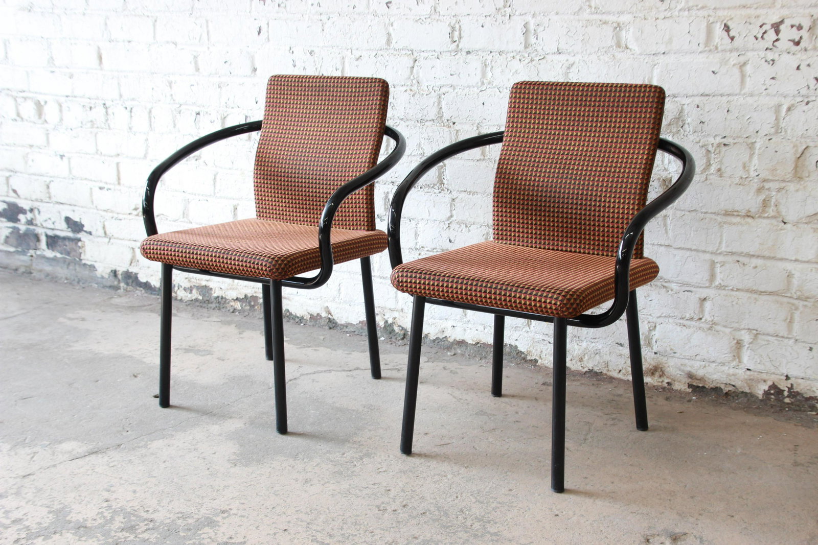Ettore Sottsass for Knoll Mandarin Armchairs A Pair: Ettore Sottsass for Knoll Mandarin Armchairs A Pair Offering a fantastic pair of "Mandarin" armchairs designed in 1986 by Ettore Sottsass for Knoll. The chairs feature curvaceous tubular steel arms fi