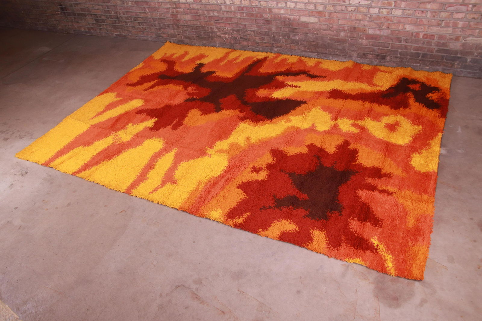 Ege Rya Danish Modern Lava Shag Wool Rug 1970s: Ege Rya Danish Modern Lava Shag Wool Rug 1970s An outstanding mid-century Danish Modern Rya shag wool rug By Ege Rya Denmark 1970s Thick wool pile with vibrant colors in orange red gold and brown. Mea