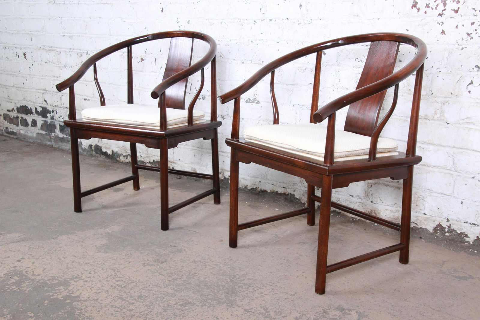 Michael Taylor for Baker Hollywood Regency Chinoiserie: Michael Taylor for Baker Hollywood Regency Chinoiserie Walnut Horseshoe Lounge Chairs Pair An exceptional pair of Hollywood Regency Chinoiserie club chairs designed by Michael Taylor for his Far East