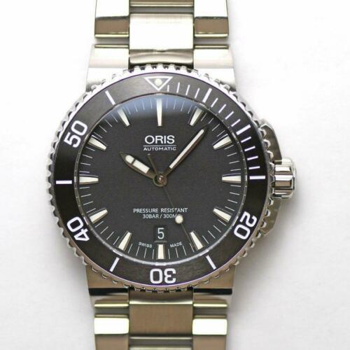 Oris Aquis Date 01 733 7653 4154-07 8 26 01PEB: Oris Aquis Date 01 733 7653 4154-07 8 26 01PEB Automatic Men's Watch Brand: Oris Type: Wristwatch Department: Mens The BIDHAUS Guarantee: All items in this auction are guaranteed authentic and come wi