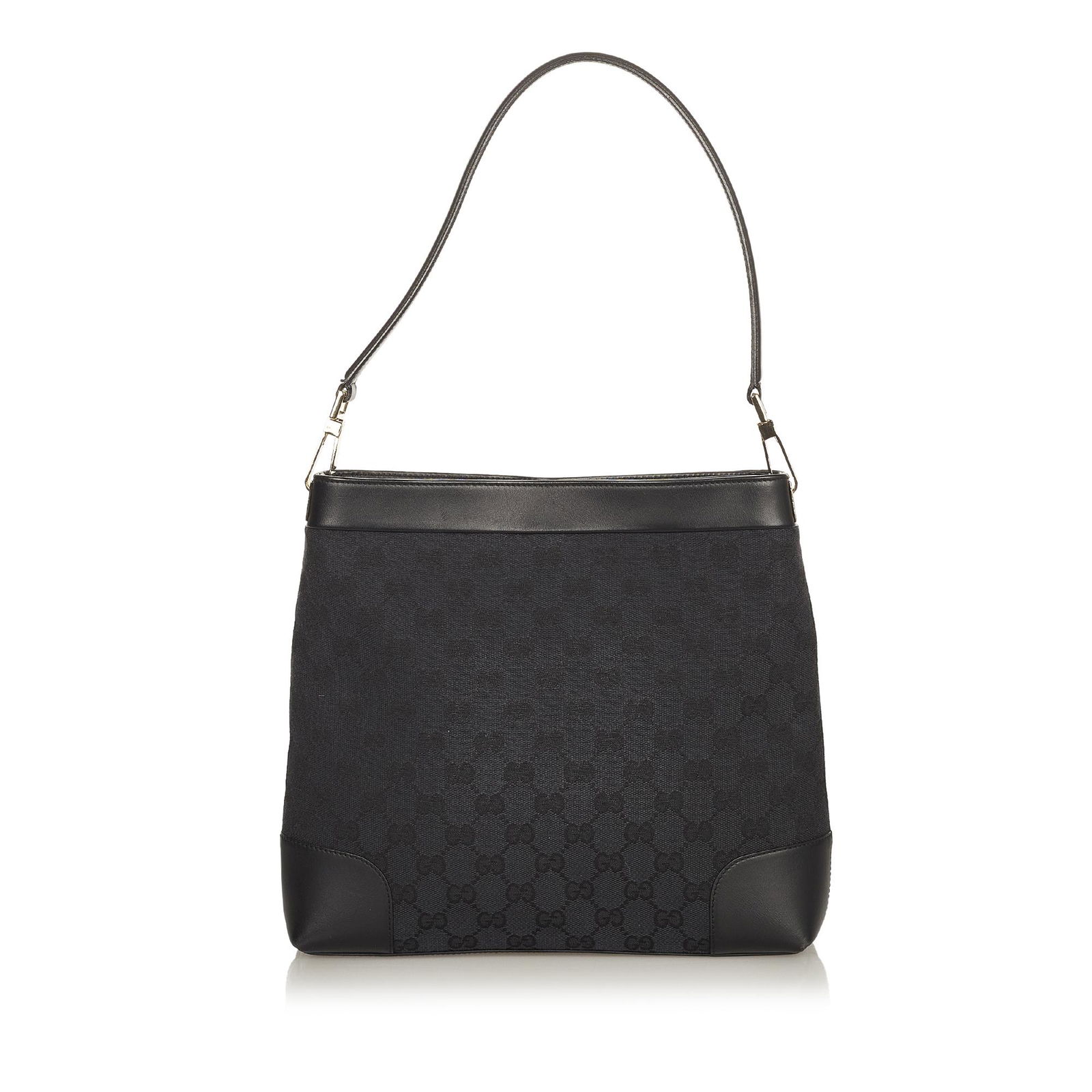 Gucci GG Canvas Shoulder Bag: Gucci GG Canvas Shoulder Bag This shoulder bag features a canvas body with leather trim a flat leather strap an open top with a magnetic snap closure and an interior zip pocket. Brand: Gucci Model: GG