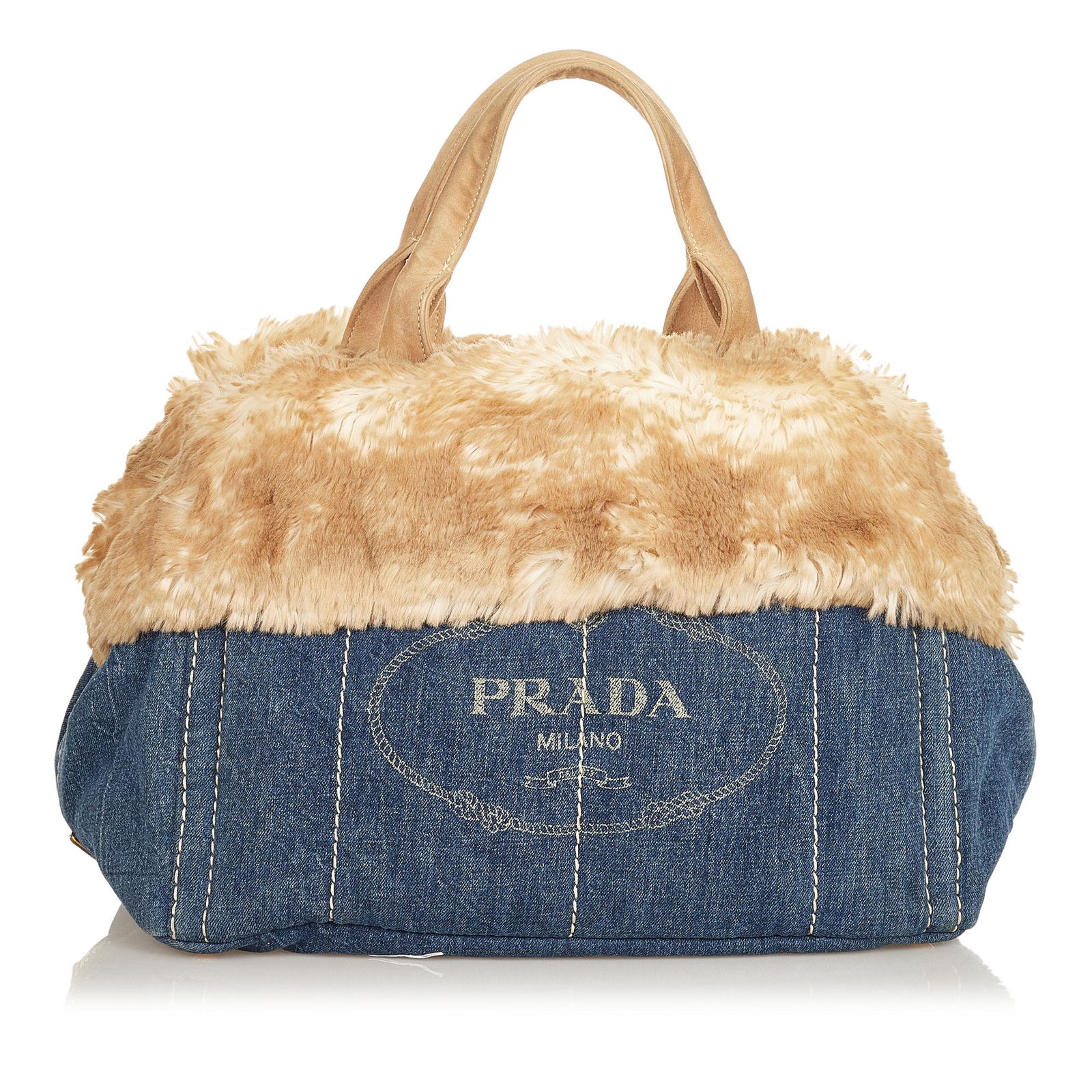 Prada Canapa Logo Denim HandBag: Prada Canapa Logo Denim HandBag This tote bag features a denim body with top faux fur details rolled suede handles an open top and interior zip pockets. Brand: Prada Model: Canapa Logo Denim HandBag O
