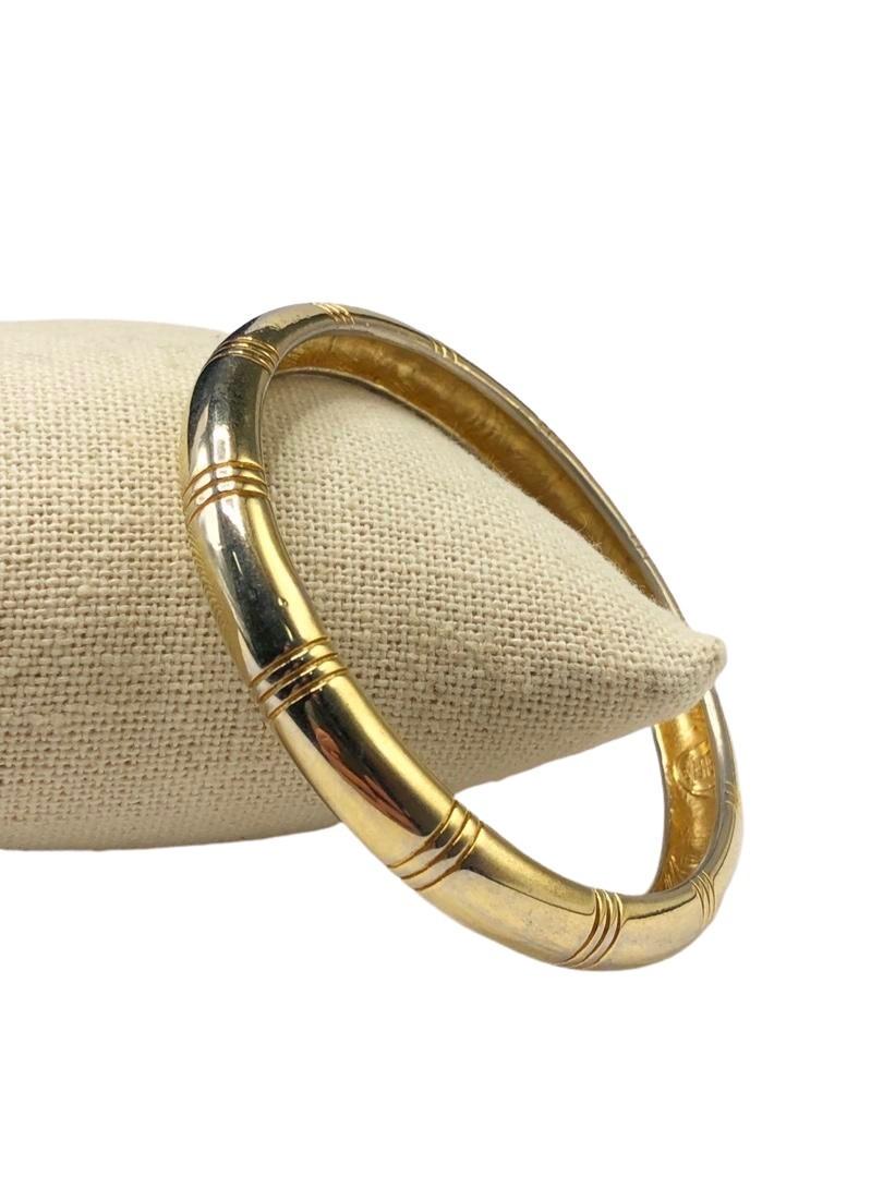 Givenchy African Inspired Etched Bangle: Givenchy African Inspired Etched Bangle Brand: Givenchy Style: Hallmark:: Fastening: Category: Bracelet Materials: Gold-plated Size: Other Remarks: The Bidhaus Guarantee: All items in this auction are