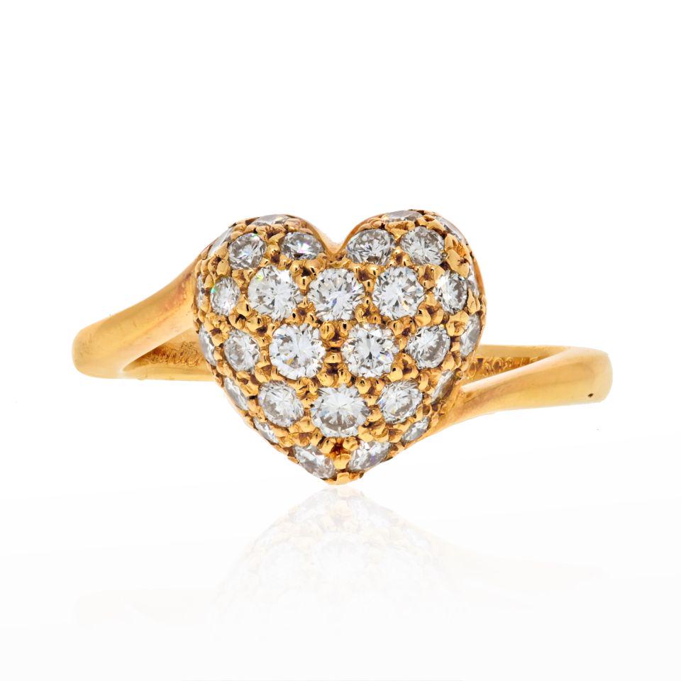 Cartier 18K Yellow Gold Pave Twisted Heart Diamond Ring: Cartier 18K Yellow Gold Pave Twisted Heart Diamond Ring Type: Estate Rings Metal: 18K Yellow Gold Grams: 3.2 Measurements: 4 Condition: Excellent. Signed By: Cartier Brand: Cartier Other Details: Eli