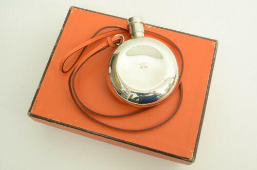 Hermes Sterling Silver Vintage Flask Necklace Orange: Hermes Sterling Silver Vintage Flask Necklace Orange Leather Base Metal: Sterling Silver Metal: Sterling Silver Vintage: Authentic Material: Leather Main Stone: N/A Shape: Round Secondary Stone: N/A B