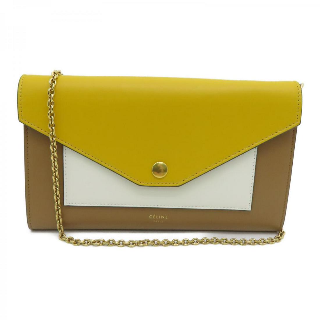 CELINE Wallet On Chain Yellow Calf: CELINE Wallet On Chain Yellow Calf Brand: CELINE Model: CELINE Wallet On Chain Yellow Calf Category: Women:Handbag Color: Yellow Dimensions: H:12cm x W:21cm x D:2.5cm Shoulder Strap (cm) : 103 / Yello