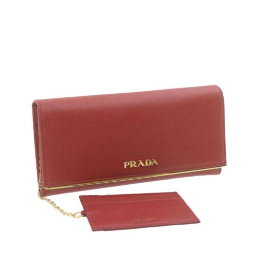 PRADA Saffiano Leather Long Wallet Red 1MH132: PRADA Saffiano Leather Long Wallet Red 1MH132 Brand: PRADA Type: unknown Color: Red Material: Leather Country/Region of Manufacture: Italy Department: Woman EAN: Does not apply The BIDHAUS Guarantee: 