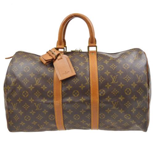 Louis Vuitton KEEPALL 45 TRAVEL HAND BAG MONOGRAM: Louis Vuitton KEEPALL 45 TRAVEL HAND BAG MONOGRAM VINTAG M41428 892FC Gender: Adult Unisex Country/Region of Manufacture: Malaysia Style: Hand bag Decade: 1980s Material: Monogram canvas Color: Brown 