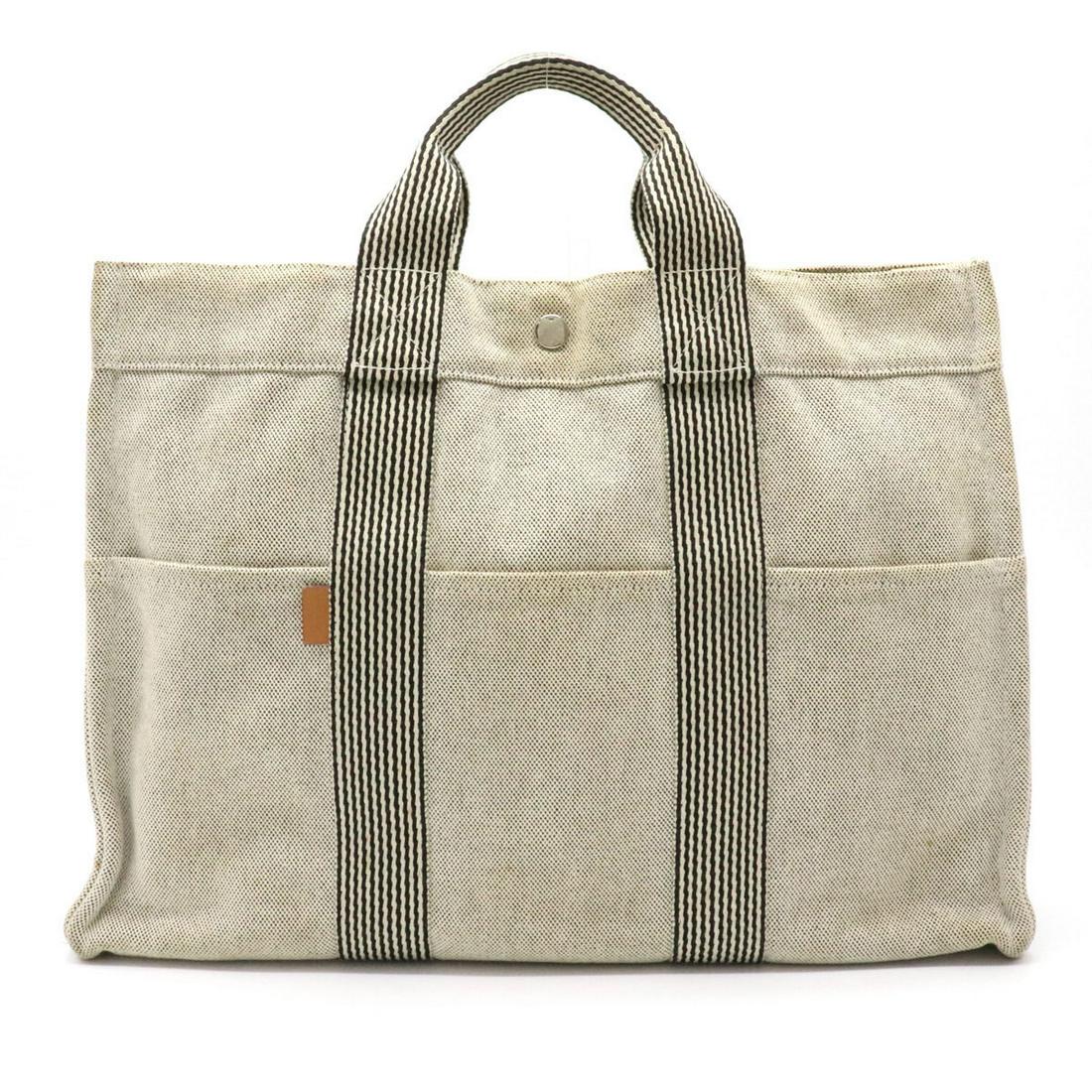 HERMES New Fool Tote MM Bag Handbag Canvas Gray Black: HERMES New Fool Tote MM Bag Handbag Canvas Gray Black Brand: Hermes Type: Handbag, Tote bag Material: Canvas Color: Black, Gray Size (HxWxD): 30cm x 41cm x 11cm / 11.81'' x 16.14'' x 4.33'' Condition: