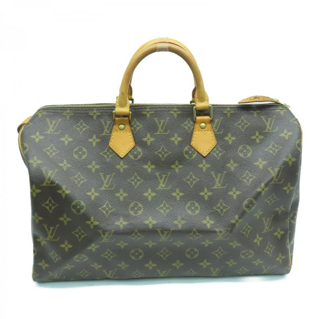 LOUIS VUITTON Speedy 40 Monogram: LOUIS VUITTON Speedy 40 Monogram Brand: LOUIS VUITTON Model: LOUIS VUITTON Speedy 40 Monogram Category: Women:Handbag Color: Dimensions: H:24cm x W:40cm x D:19cm / M41522 / TH1013 The BIDHAUS Guarante