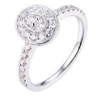 Diamond Oval Halo Slim Shank Ring In 14k White Gold: 14 Karat White Gold Ring With 28 Round Brilliant Diamonds 0.50ctw Style: Fashion Primary Stone: Diamond Gender: Ladies Metal:14K White Gold Country of Origin: China Dimensions (LxWxH in mm): 10.5 X 9.