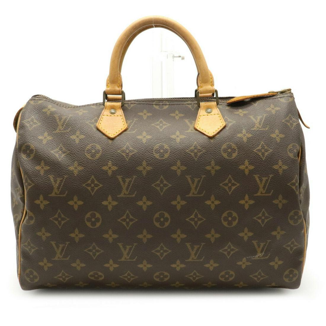 LOUIS VUITTON Monogram Speedy 35 Handbag Boston Bag: LOUIS VUITTON Monogram Speedy 35 Handbag Boston Bag Mini Travel M41524 Brand: Louis Vuitton Line: Monogram Type: Boston bag, Handbag Material: Monogram Size (HxWxD): 23cm x 35cm x 19cm / 9.05'' x 13.7