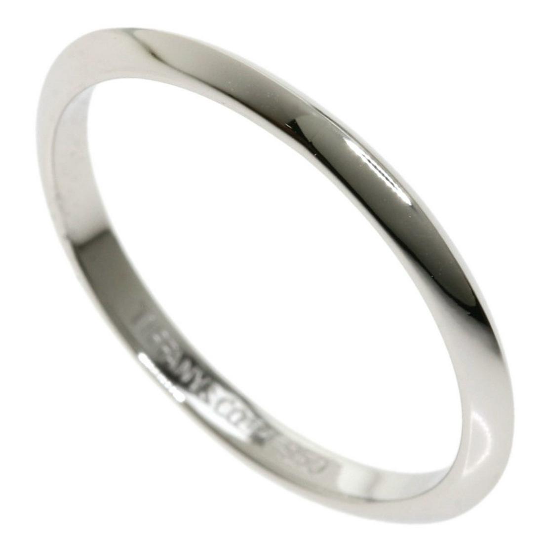 Tiffany Band Ring / Platinum PT950 Ladies: Tiffany Band Ring / Platinum PT950 Ladies Brand: Tiffany Type: Band ring Gender: Women Material: Platinum 950 Condition: Used (very good) Overall Scratches: Insignificant Width: 1.9mm / 0.07'' Weight: