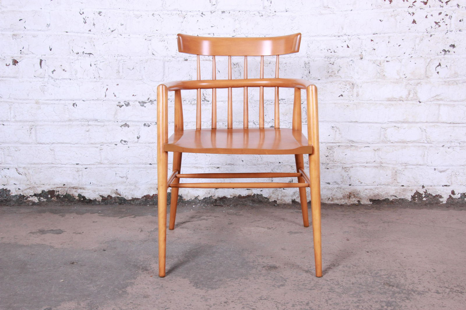 Paul McCobb Planner Group Solid Maple Spindle Back: Paul McCobb Planner Group Solid Maple Spindle Back Armchair Offering a rare and beautiful mid-century modern captain armchair designed by Paul McCobb for his Planner Group line for Winchendon Furnitur