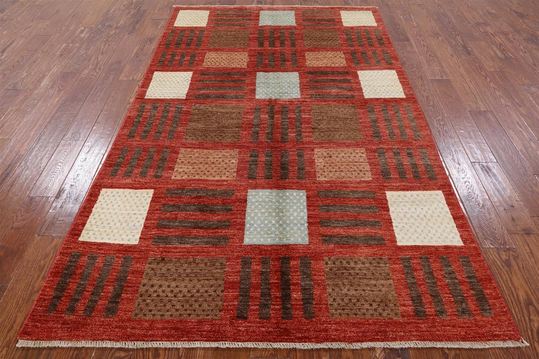 5' 5" X 8' 10" Hand-Knotted Gabbeh Wool Area Rug: 5' 5" X 8' 10" Hand-Knotted Gabbeh Wool Area Rug Design: Geometric Exact Size: 5\ 5 X 8\ 10 Style: Gabbeh Foundation: Cotton Pile: Wool Weave: Hand-knotted Age: New The BIDHAUS Guarantee: All items in