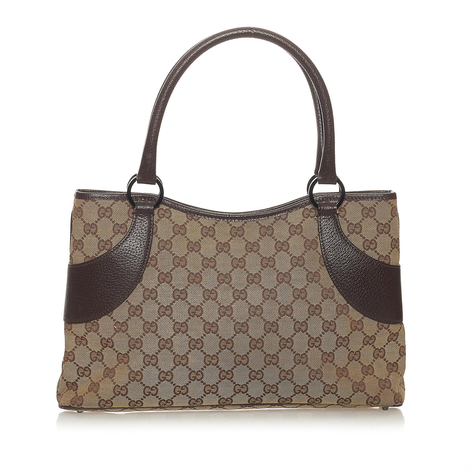 Gucci GG Canvas Tote Bag: Gucci GG Canvas Tote Bag This tote bag features a canvas body with leather trim rolled leather straps an open top with a magnetic closure and an interior zip pocket. Brand: Gucci Model: GG Canvas Tote