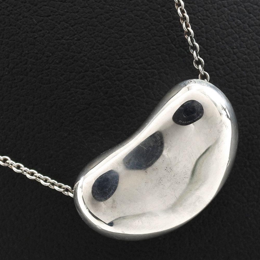 TIFFANY & Co. Bean Elsa Peretti Silver 925 Women's Necklace: TIFFANY & Co. Bean Elsa Peretti Silver 925 Women's NecklaceBrand: Tiffany Material: Silver 925 Accessories: None Condition: Used (very good) Line: Bean Gender: Women Necklace Type: Pendant necklace We