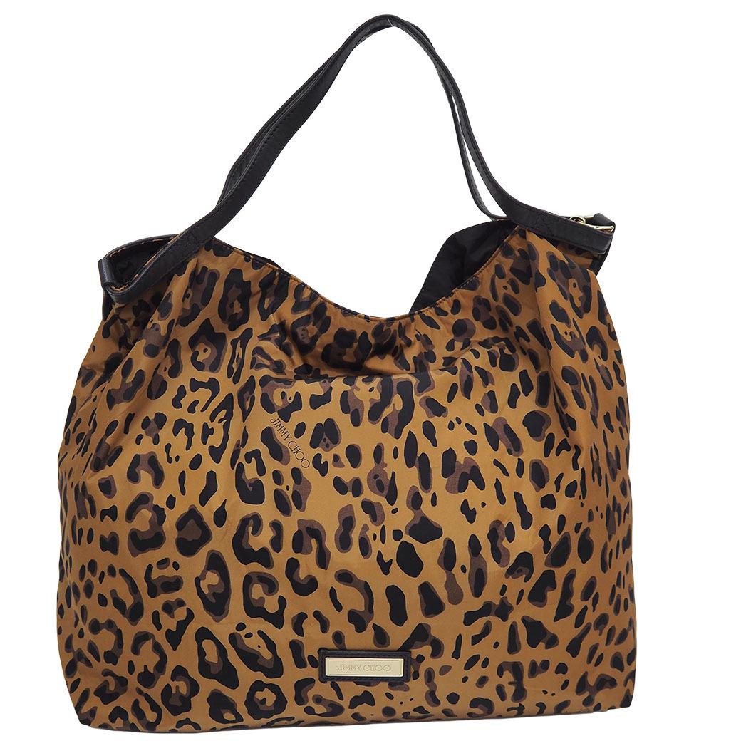 Jimmy Choo Nylon Handbag Brown: Jimmy Choo Nylon Handbag BrownBrand: Jimmy Choo Material: Nylon Color: Brown Size (HxWxD): 36cm x 39cm x 16cm / 14.17'' x 15.35'' x 6.29'' Accessories: Guarantee card, Pouch Condition: Used (very good