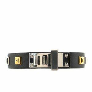 Hermes Black Leather Mini Dog Clous Square Bracelet: Hermes Black Leather Mini Dog Clous Square Bracelet Hermes Black Leather Mini Dog Clous Square Bracelet features\ Swift calfskin decorated with square studs and palladium plated hardware. The BIDHAUS 