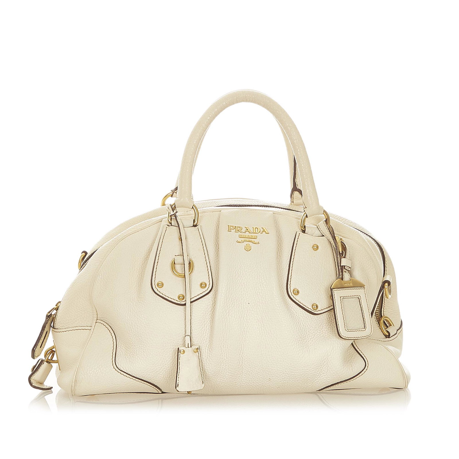 Prada Vitello Daino Leather Satchel: Prada Vitello Daino Leather Satchel This satchel features a leather body rolled leather handles a detachable leather strap a top zip closure and an interior zip pocket. Brand: Prada Model: Vitello Dai