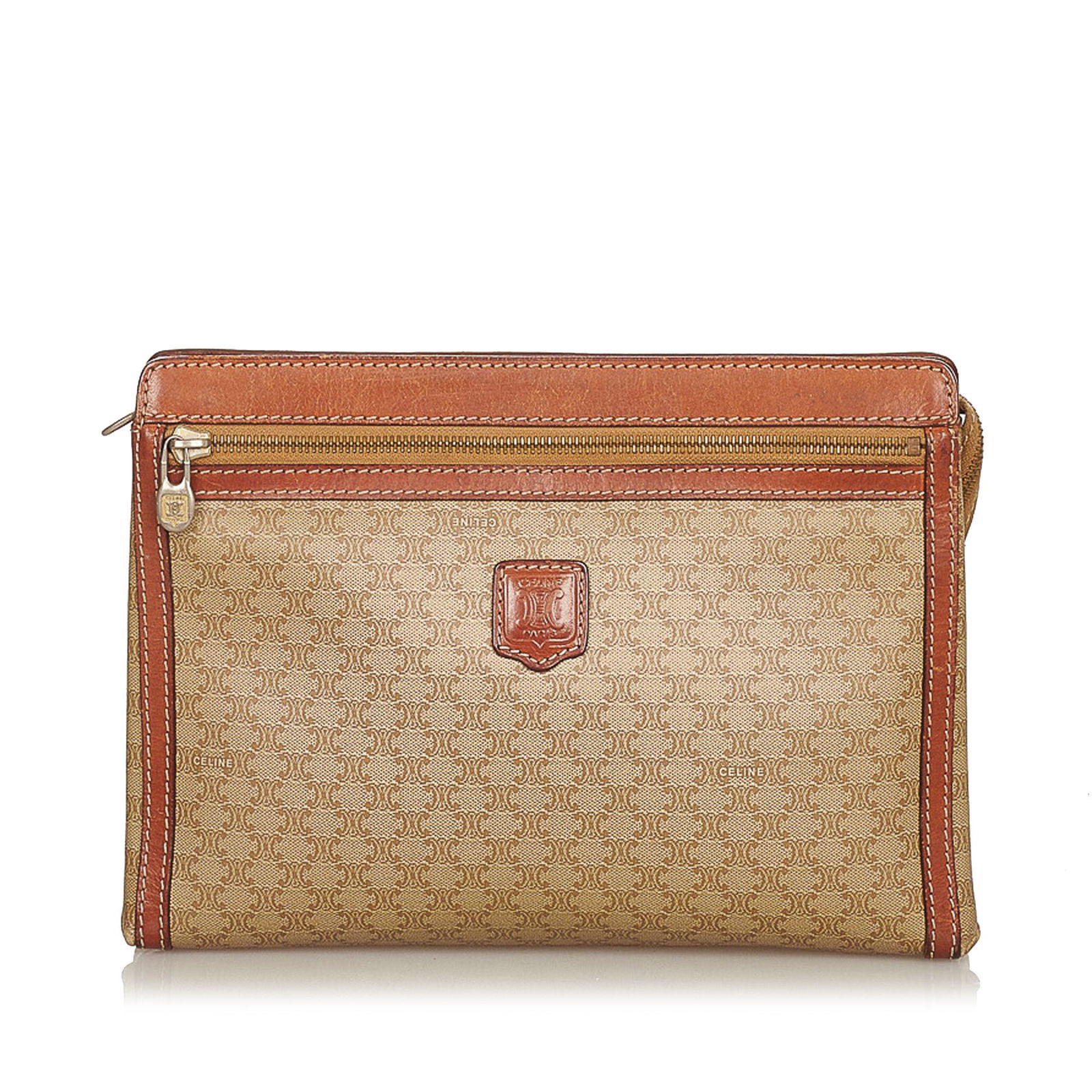 Celine Macadam Clutch Bag: Celine Macadam Clutch Bag This clutch bag features a PVC body with leather trim an exterior front zip pocket an exterior back slip pocket a top zip closure and an interior zip pocket. Brand: Celine Mo