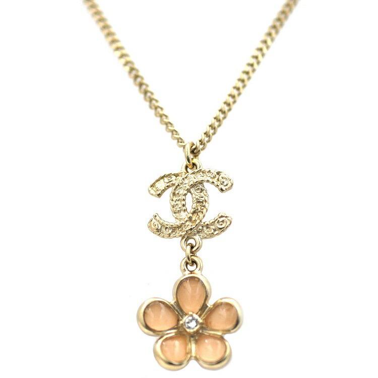 Chanel Necklace Gold Pink Coco Mark A96882 Camellia Swing GP A18 V Ladies Pendant Stone Long: Chanel Necklace Gold Pink Coco Mark A96882 Camellia Swing GP A18 V Ladies Pendant Stone LongBrand: Chanel Color: Gold, Pink Condition: Used (good) Gender: Women Necklace Type: Necklace Weight: 9.8g / 