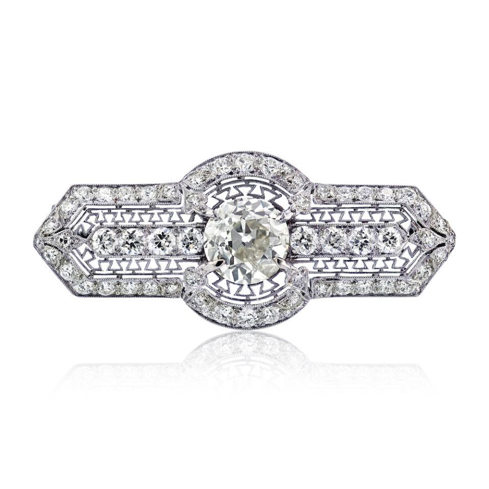 Marcus & Co. Art Deco Platinum 3.52 Carat Old European Cut Open Framework Diamond Brooch: Marcus & Co. Art Deco Platinum 3.52 Carat Old European Cut Open Framework Diamond Brooch Type: Brooches Metal: Platinum Grams: 10.2 Exact Diamond Weight: 3.52 Cts Measurements: L: 1.75 inches wide Con