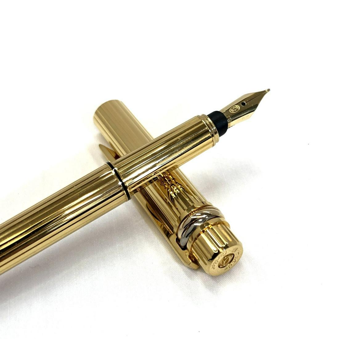 Cartier Fountain Pen Trinity Gold M K18 750 Mast Converter Case Men's Women's: Cartier Fountain Pen Trinity Gold M K18 750 Mast Converter Case Men's Women's Brand: Cartier Model: RLV0573 Country of Origin: France Type: Fountain pen Design: Pattern Gender: Men Women Material (Bod