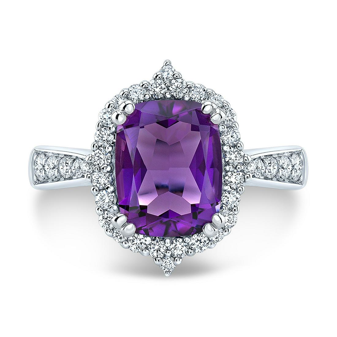 Amethyst Elongated Cushion Shield Ring With Diamond Border And Tapered Shank In 14k White Gold: 14kw Ring 1cuam=9x7mm 40rb=0.40ctw Size 5 Style: Fashion Primary Stone: Amethyst Gender: Ladies Metal:14K White Gold Country of Origin: China The BIDHAUS Guarantee: All items in this auction are guara