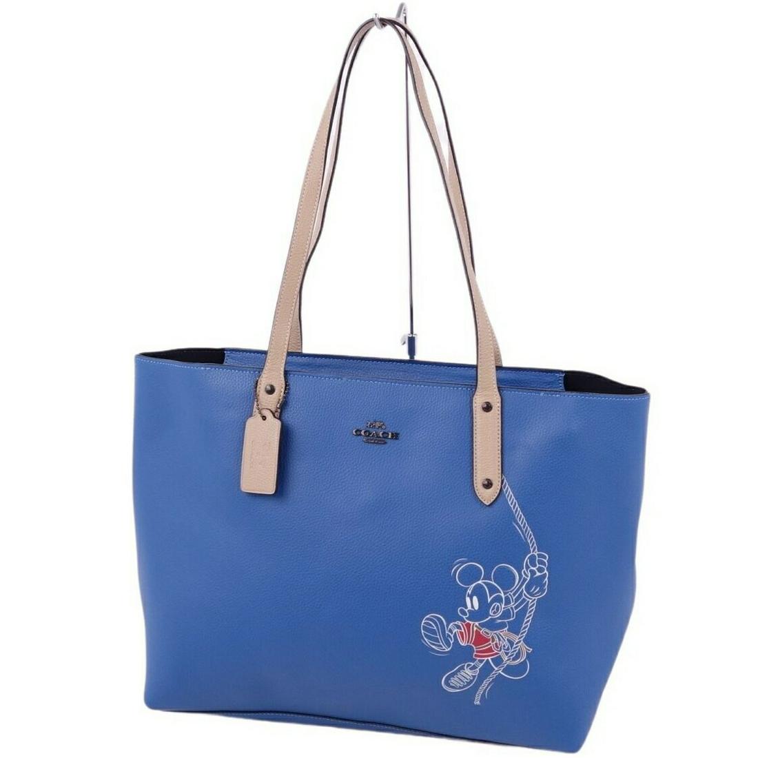 Coach COACH Bag Central Disney Mickey Tote Leather Men's Women's Blue: Coach COACH Bag Central Disney Mickey Tote Leather Men's Women's Blue Brand: Coach Type: Tote bag Color: Blue Gender: Men Women Size (HxWxD): 28cm x 43cm x 15cm / 11.02 x 16.92 x 5.9 Handle Length: 76