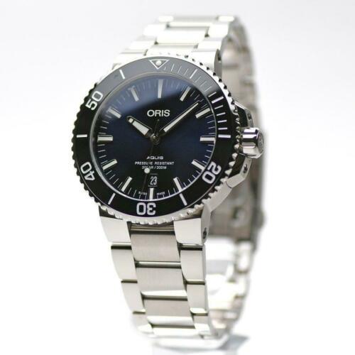 Oris 01 733 7730 4135-07 8 24 05PEB Aquis Date Automatic Men's Watch: Oris 01 733 7730 4135-07 8 24 05PEB Aquis Date Automatic Men's Watch Brand: Oris Type: Wristwatch Department: Mens The BIDHAUS Guarantee: All items in this auction are guaranteed authentic and come wi