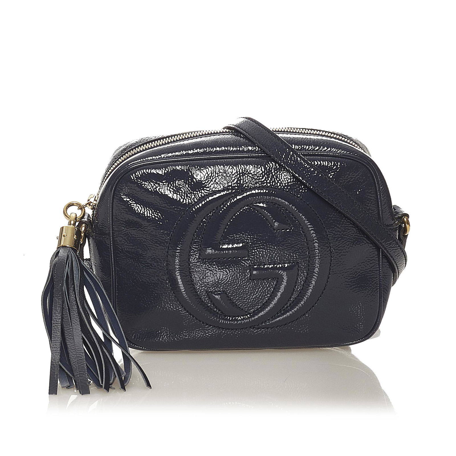 Gucci Soho Disco Leather Crossbody Bag: Gucci Soho Disco Leather Crossbody Bag The Soho Disco Crossbody bag features a leather body an adjustable flat leather strap a tassel detail a top zip closure and interior slip pockets. Brand: Gucci M