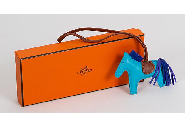 Hermes Rare Grigri Bag Charm Turquoise: Hermes Rare Grigri Bag Charm Turquoise Condition: New Era: Contemporary; 2000s Dimensions: 4" L x 3" W Materials: leather Color: turquoise gold electric blue Hermes very rare and sold out grigri rodeo