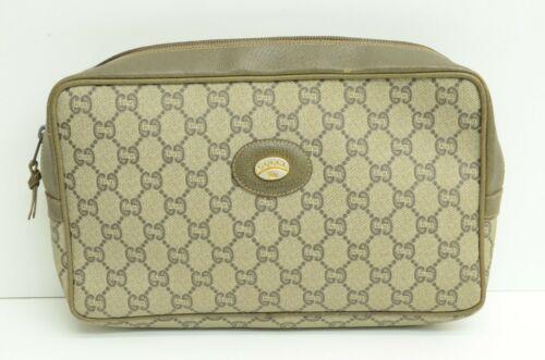 Gucci Plus Clutch Vintage Guccissima Leather Canvas Bag GP: Gucci Plus Clutch Vintage Guccissima Leather Canvas Bag GP Features: Inner Pockets Handle Style: Shoulder Strap Exterior Color: Beige Department: Women Strap Drop: 46 cm Pattern: Logo Exterior Materia
