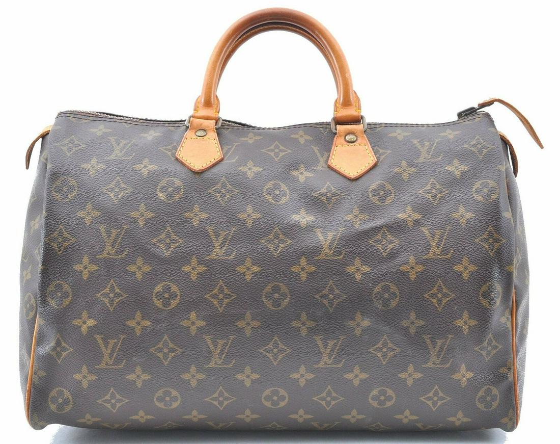 Louis Vuitton Monogram Speedy 35 Hand Bag Old Model LV: Louis Vuitton Monogram Speedy 35 Hand Bag Old Model LV Brand: Louis Vuitton Exterior Material: Monogram Canvas Style: Hand Bag Department: Women Exterior Color: Brown Bag Height: 9inches(23cm) Bag Dep
