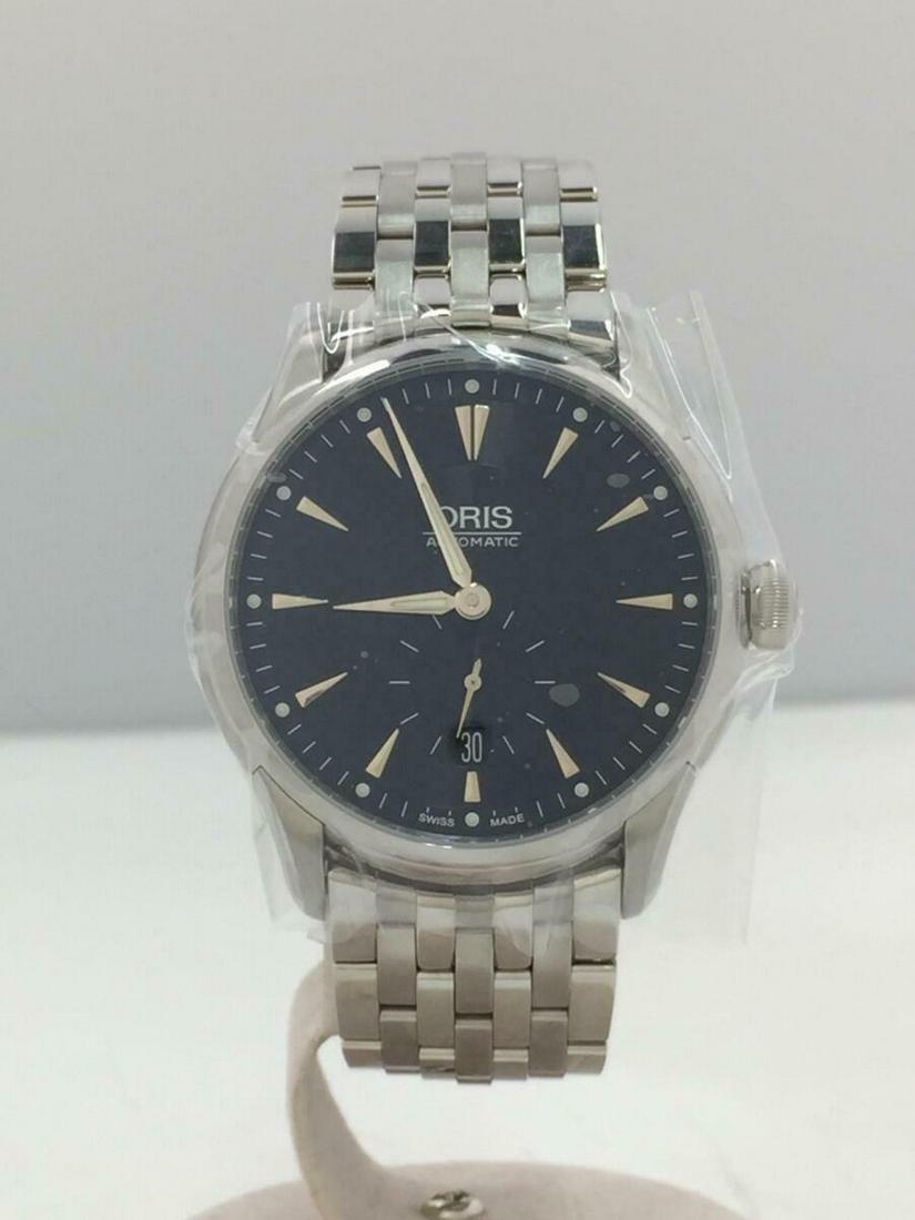 ORIS 7582 Self-winding Analog Stainless Steel Silver Automatic Men's Watch: ORIS 7582 Self-winding Analog Stainless Steel Silver Automatic Men's Watch Brand: Oris Type: Wristwatch Department: Mens Pre-Owned The BIDHAUS Guarantee: All items in this auction are guaranteed authe