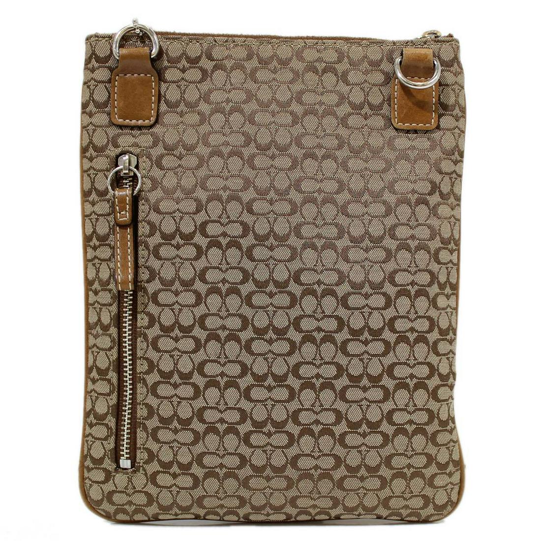 COACH Coach Mini Signature Brown Shoulder Pouch Bag: COACH Coach Mini Signature Brown Shoulder Pouch Bag Brand: Coach Model: Mini Signature Brown Shoulder Pouch Shoulder Bag Type: Pouch Shoulder bag Material: Signature line Signature line: Color: Brown